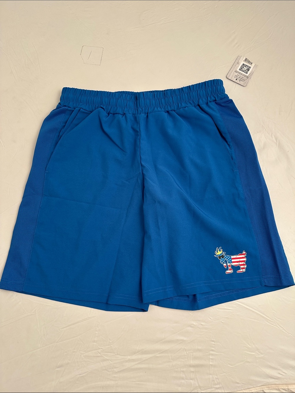 Goat Freedom Collection blue athletic performance shorts Chuck the Goat logo S
